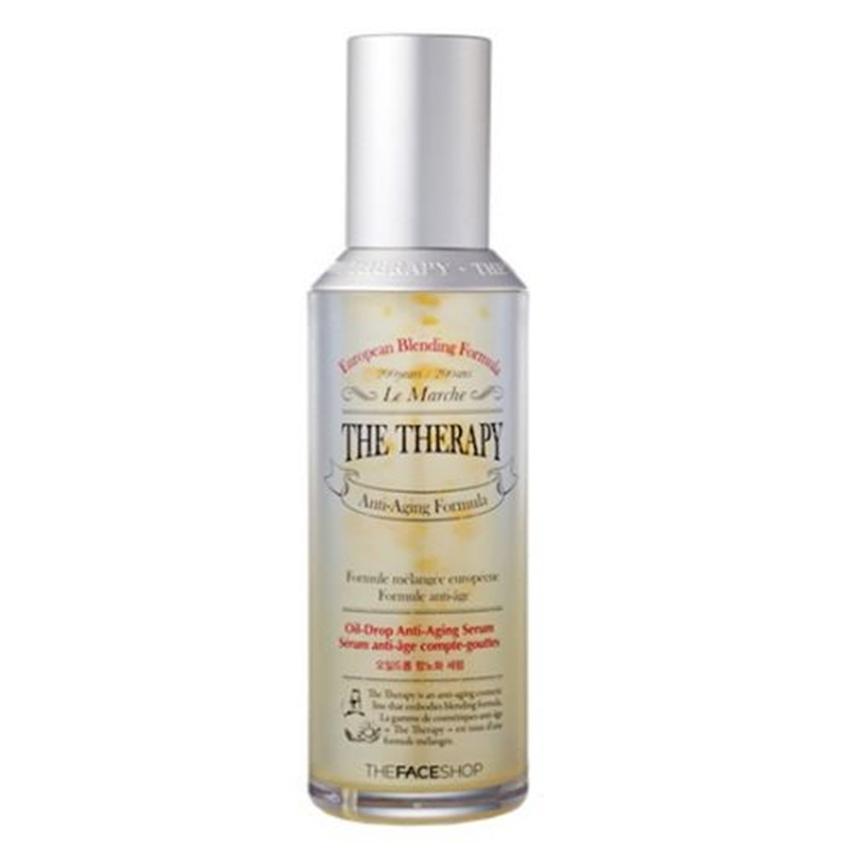 The Face Shop The Therapy oil-drop anti-aging serum in a clear glass bottle with a dropper dispenser