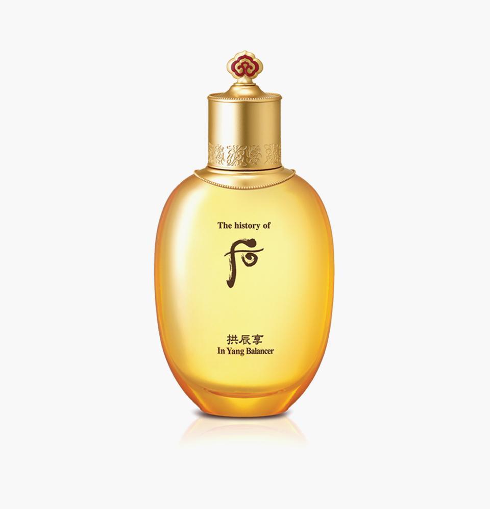 The History of Whoo Gongjinhyang In Yang Balancer in an ornate gold bottle
