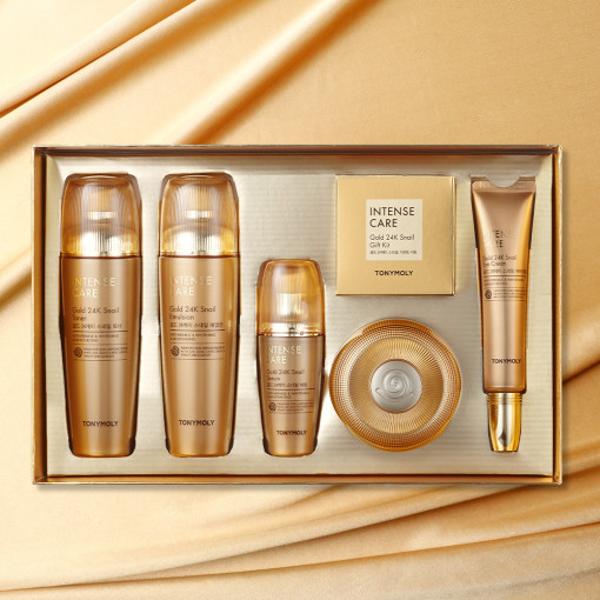 TONYMOLY Intense Care Gold 24K Snail three-piece skincare set in metallic gold bottles