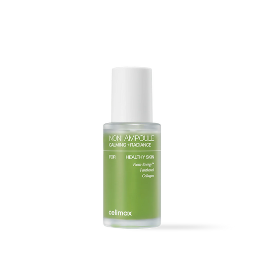Celimax The Real Noni Energy Ampoule in a green glass dropper bottle with a clear pump top and green liquid serum