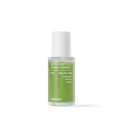 Celimax The Real Noni Energy Ampoule in a clear glass bottle with vibrant green liquid and a white dropper cap