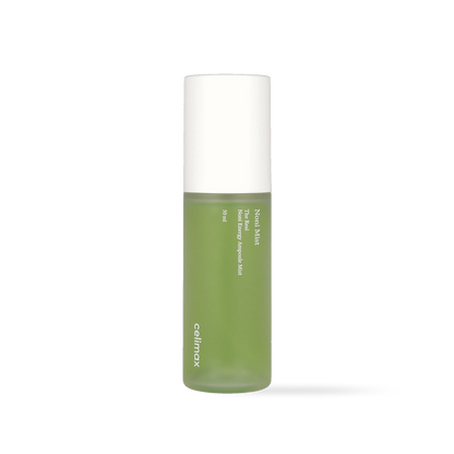 Celimax The Real Noni Energy Ampoule Mist in a clear spray bottle with vibrant green liquid and a white cap