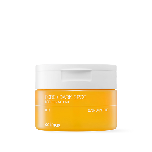 Celimax Pore and Dark Spot Brightening Pad 40 count in a clear jar with yellow and white minimalist labeling