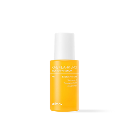 Celimax Pore and Dark Spot Brightening Serum in a clear glass bottle with a minimalist white and yellow label