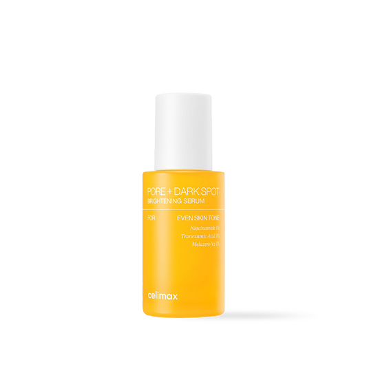 Celimax Pore and Dark Spot Brightening Serum in a clear glass bottle with a minimalist white and yellow label