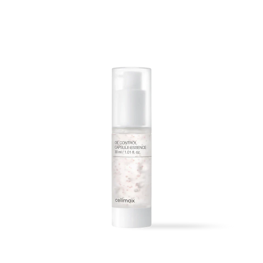 Celimax Oil Control Capsule Essence in a clear glass bottle with blue moisture capsules and a white pump top