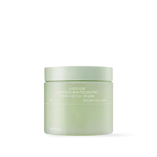 Celimax Ji Woo Gae Heartleaf BHA Peeling Pad 60pads in a green jar with textured white cotton pads inside