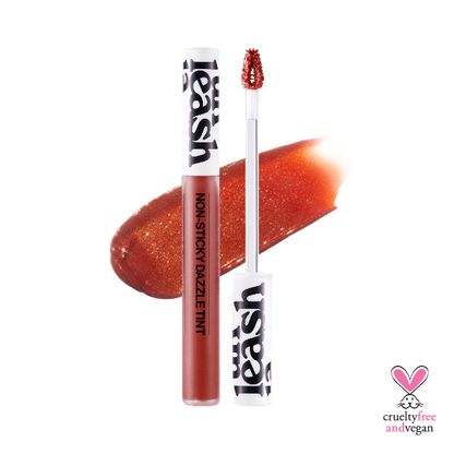 Unleashia Non-Sticky Dazzle Tint lip gloss in a clear tube with visible glitter particles