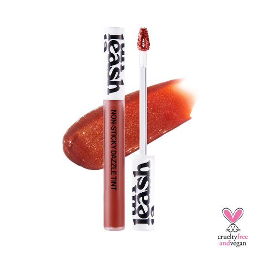 Unleashia Non-Sticky Dazzle Tint lip gloss in a clear tube with visible glitter particles