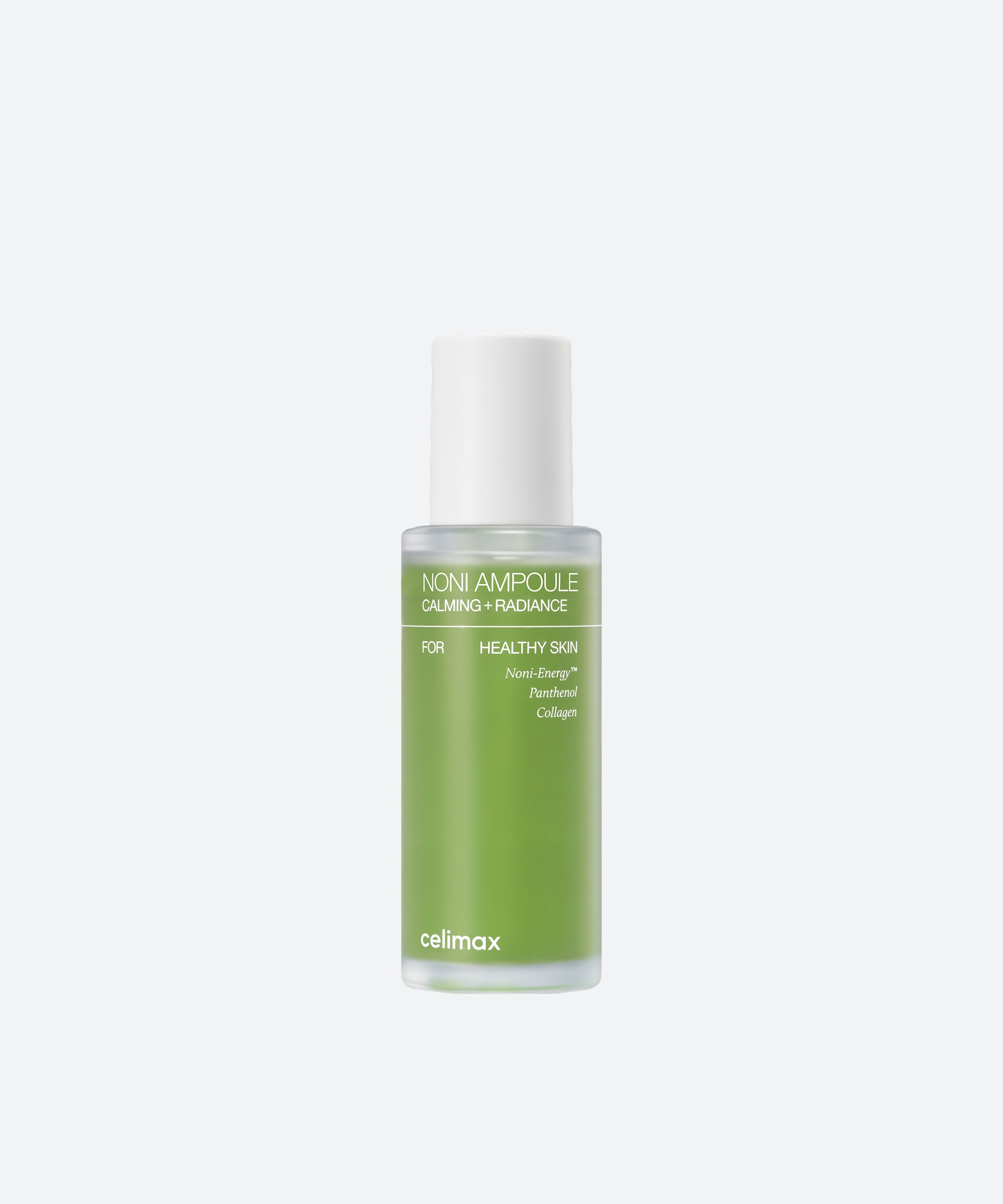Celimax The Real Noni Energy Ampoule in a clear glass bottle with vibrant green liquid and a white dropper cap
