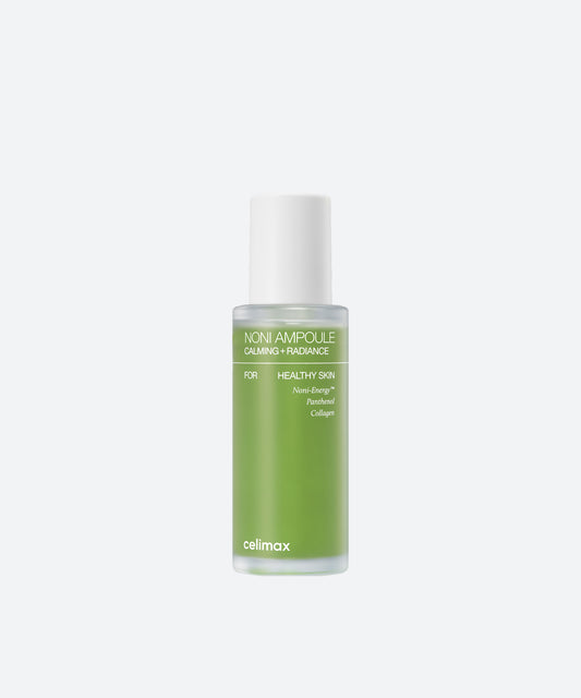 Celimax The Real Noni Energy Ampoule in a clear glass bottle with vibrant green liquid and a white dropper cap