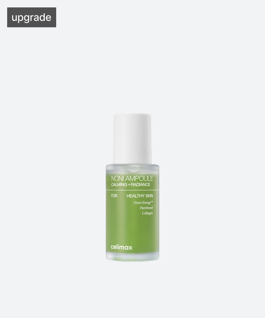 Celimax The Real Noni Energy Ampoule in a green glass dropper bottle with a clear pump top and white label