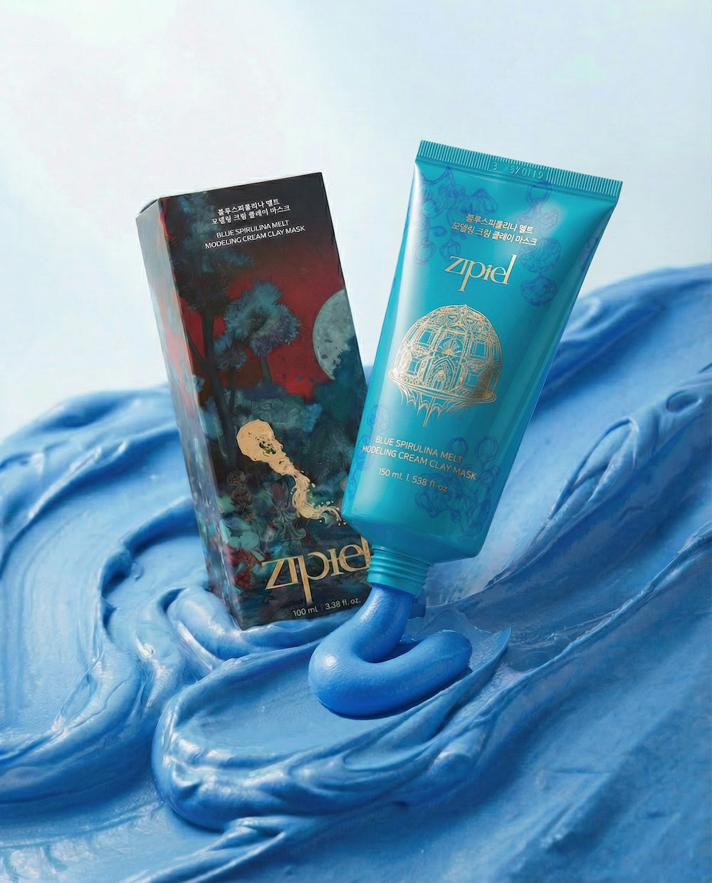 Zipiel Blue Spirulina Melt Modeling Cream Clay Mask in a white jar with vibrant blue cream texture visible inside