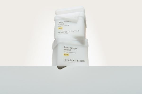 Sungboon Editor Deep Collagen Retinol Power Boosting Pad jar with pink label and textured pads