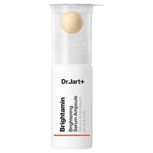 Dr. Jart Britamine Brightening Serum in a small yellow and white pump bottle with a clear cap