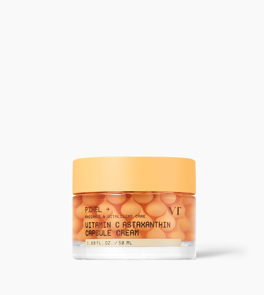 VT Cosmetics Vitamin C Astaxanthin Capsule Cream in a clear jar with orange gel and suspended cream capsules