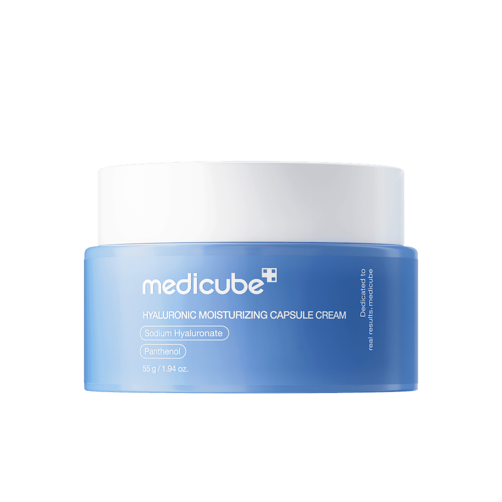 Medicube Hyaluronic Moisturizing Capsule Cream in a clear jar featuring small blue suspended moisture capsules