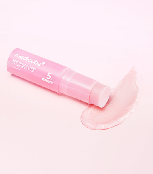 Medicube PDRN Pink Collagen Volume Multi Balm in a metallic pink twist-up stick container