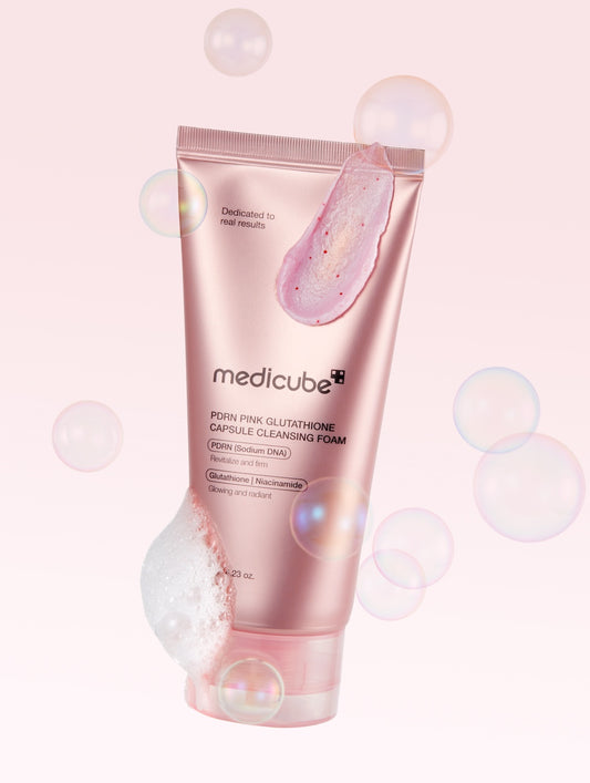 Medicube PDRN Pink Glutathione Capsule Cleansing Foam in a white tube with pink accents and visible pink capsules