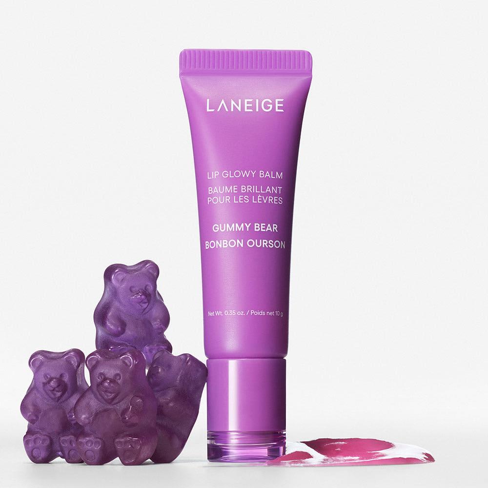 Laneige Lip Glowy Balm Gummy Bear in a purple squeeze tube with a sheer violet tint finish