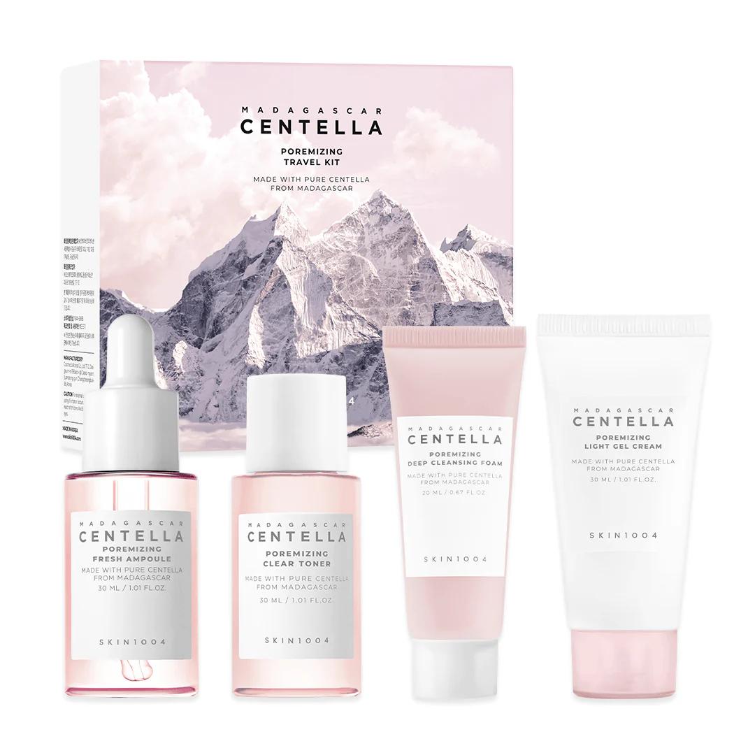 Skin1004 Madagascar Centella Poremizing Travel Kit featuring five pink and white miniature skincare bottles in a box