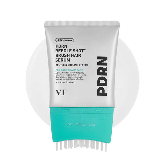 VT Cosmetics PDRN Reedle Shot Hair Serum in a silver and blue pump bottle with an integrated scalp applicator brush