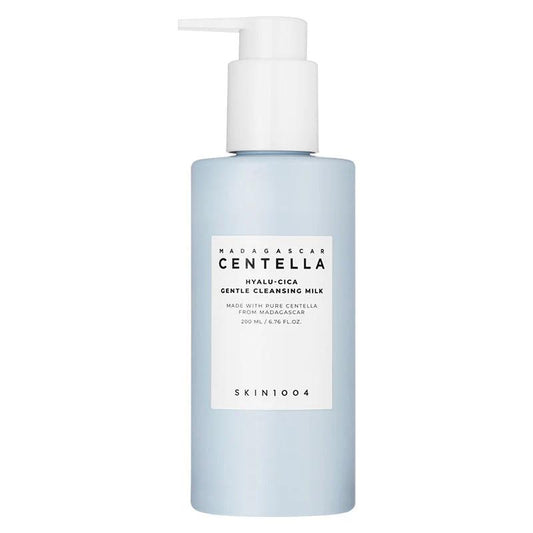 SKIN1004 Madagascar Centella Hyalu-Cica Gentle Cleansing Milk in a tall white pump bottle with a light blue label